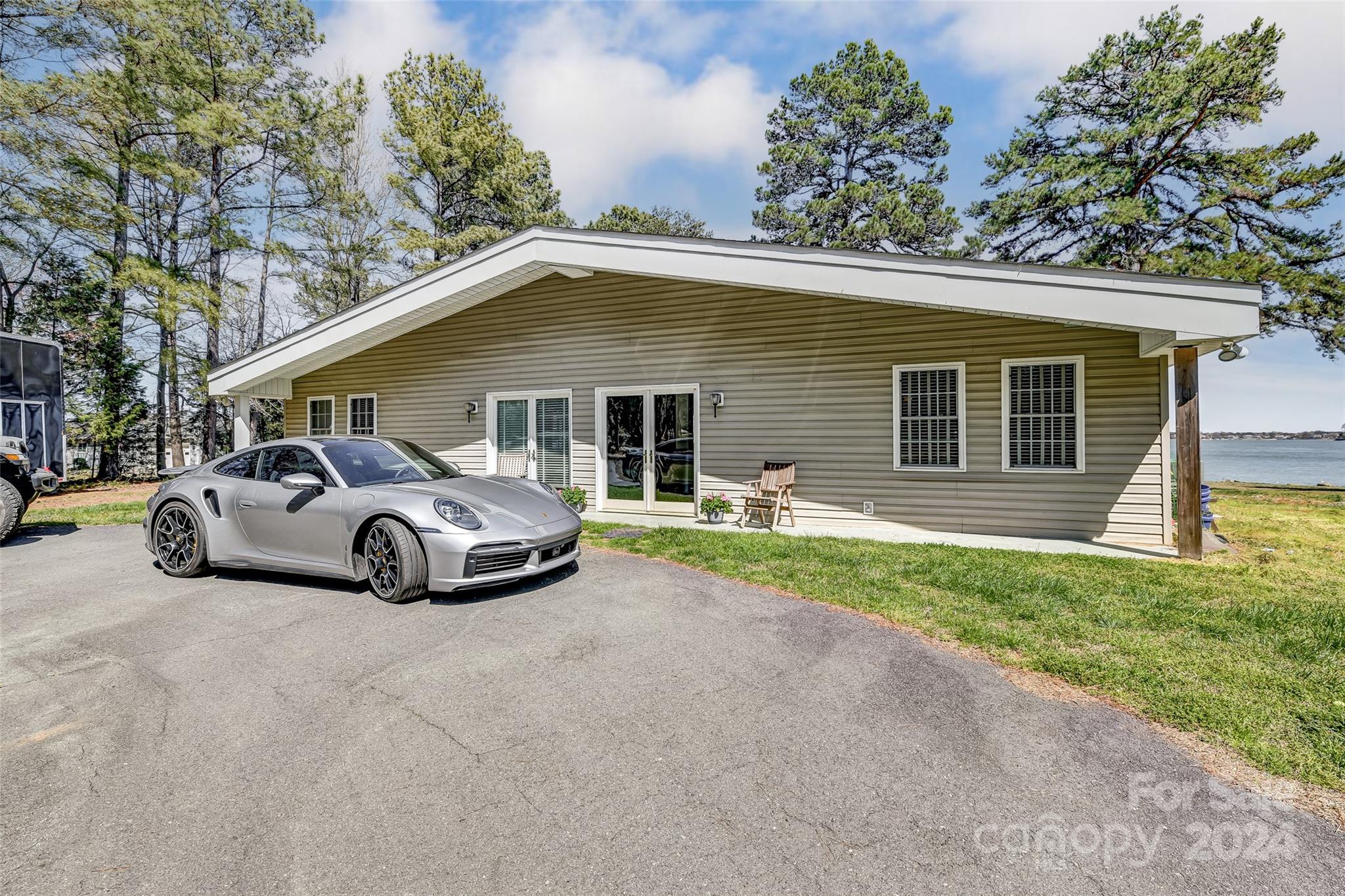 8303 Luckey Point Road Denver, NC 28037 - Photo 13 of 40 a view of a car parked in front of a house