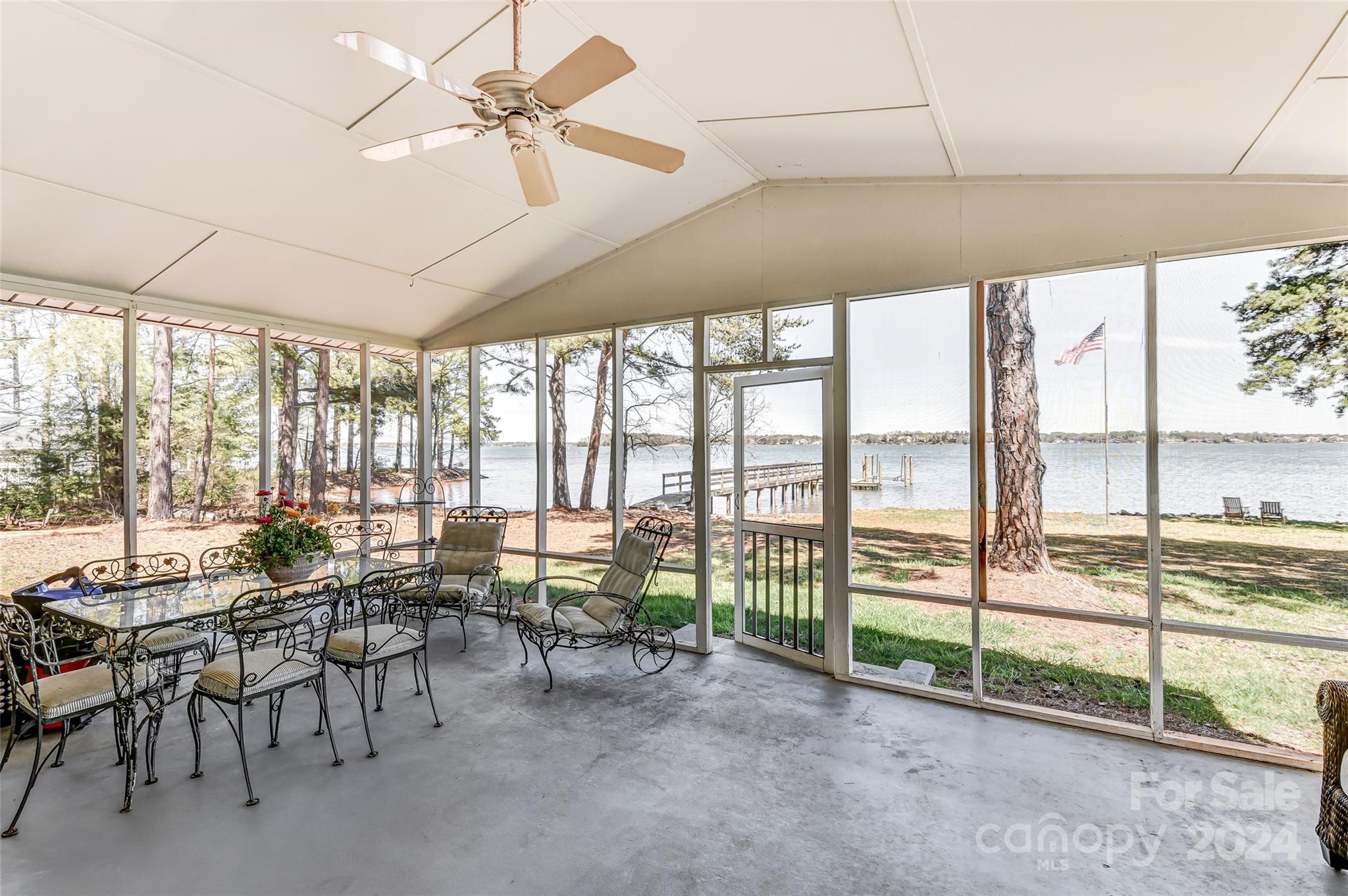 8303 Luckey Point Road Denver, NC 28037 - Photo 25 of 40 a view of a big room with balcony and furniture