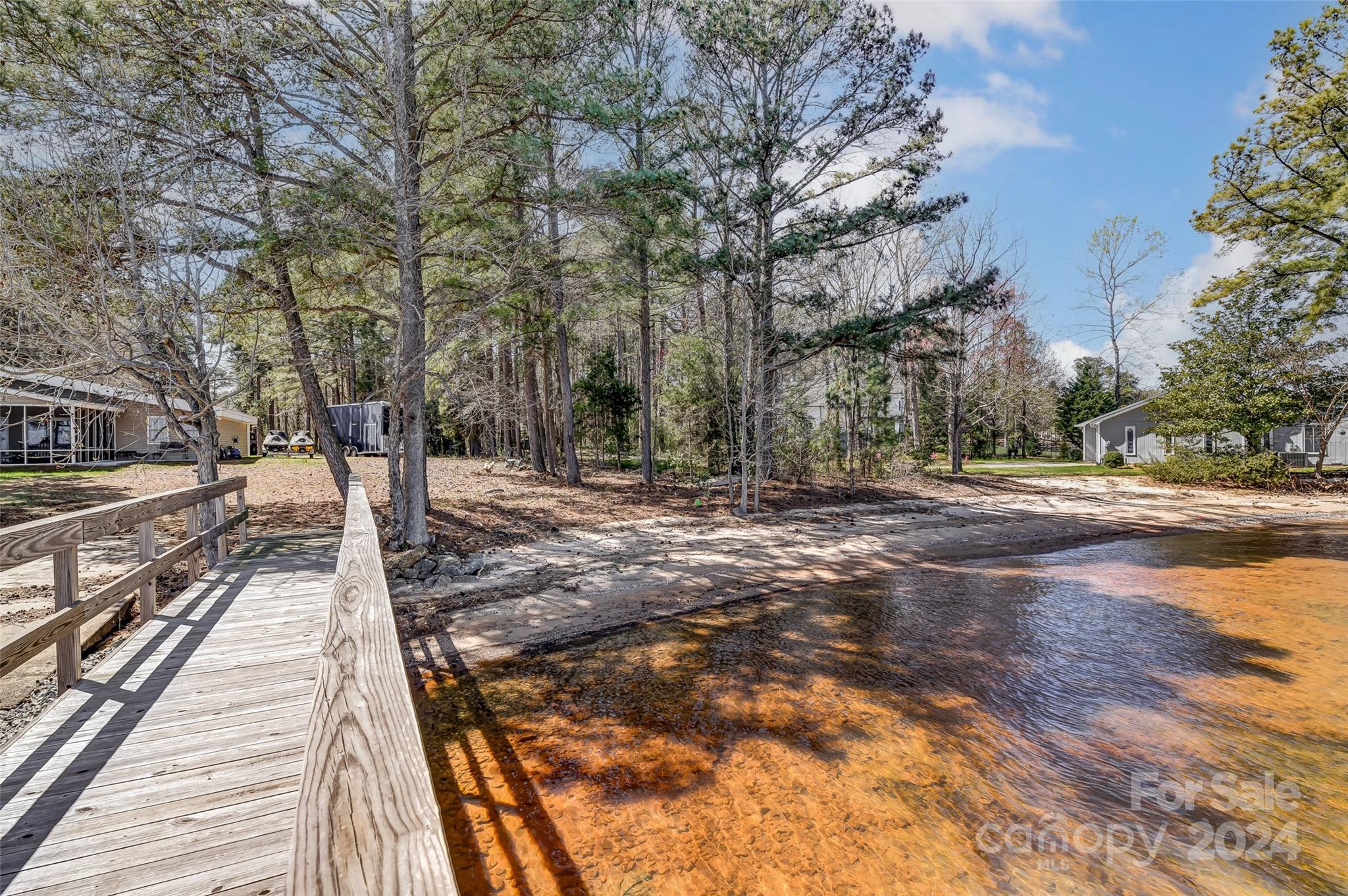 8303 Luckey Point Road Denver, NC 28037 - Photo 32 of 40 a view of a yard with trees