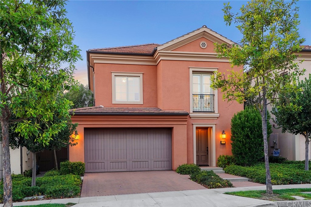 77 Borghese Irvine, CA 92618 - Photo 1 of 1 a front view of a house with a garage
