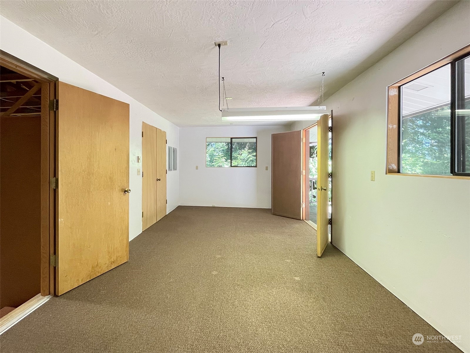 104 Waldo Road Sequim, WA 98382 - Photo 29 of 40 a view of empty room with windows