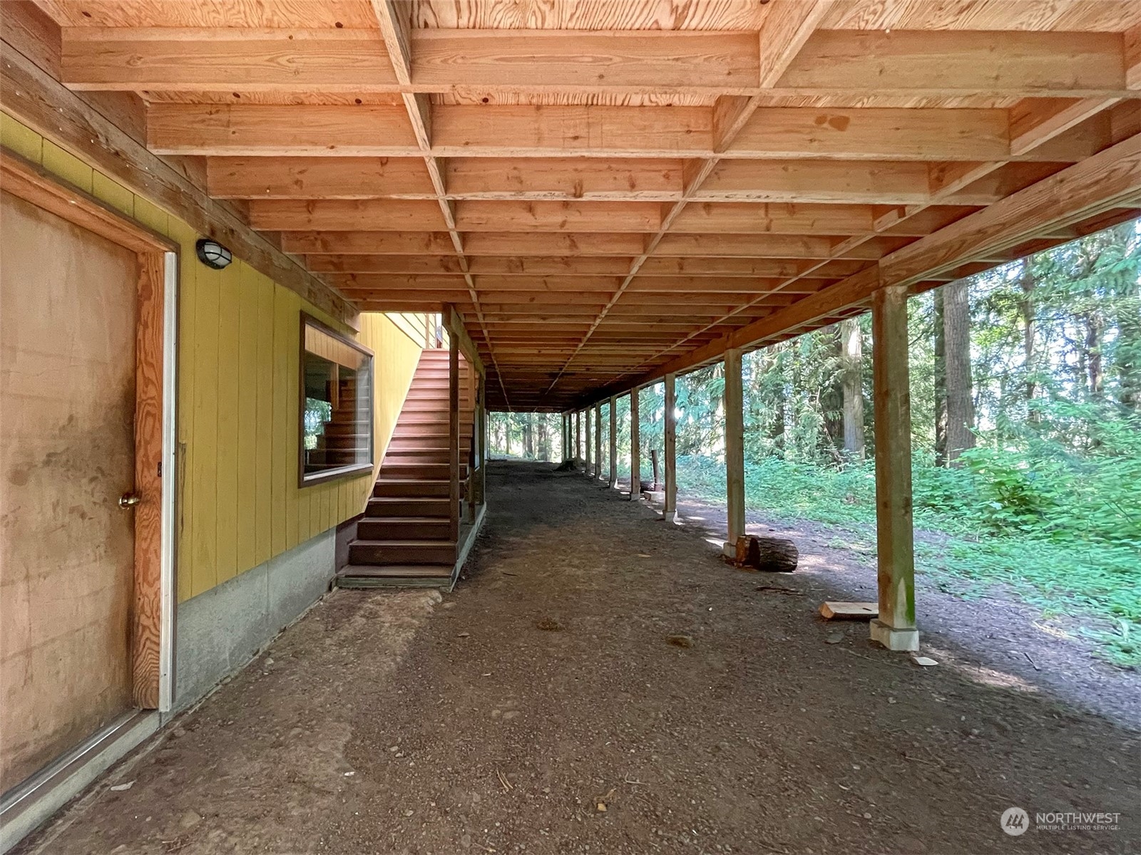 104 Waldo Road Sequim, WA 98382 - Photo 31 of 40 a view of a room with wooden walls