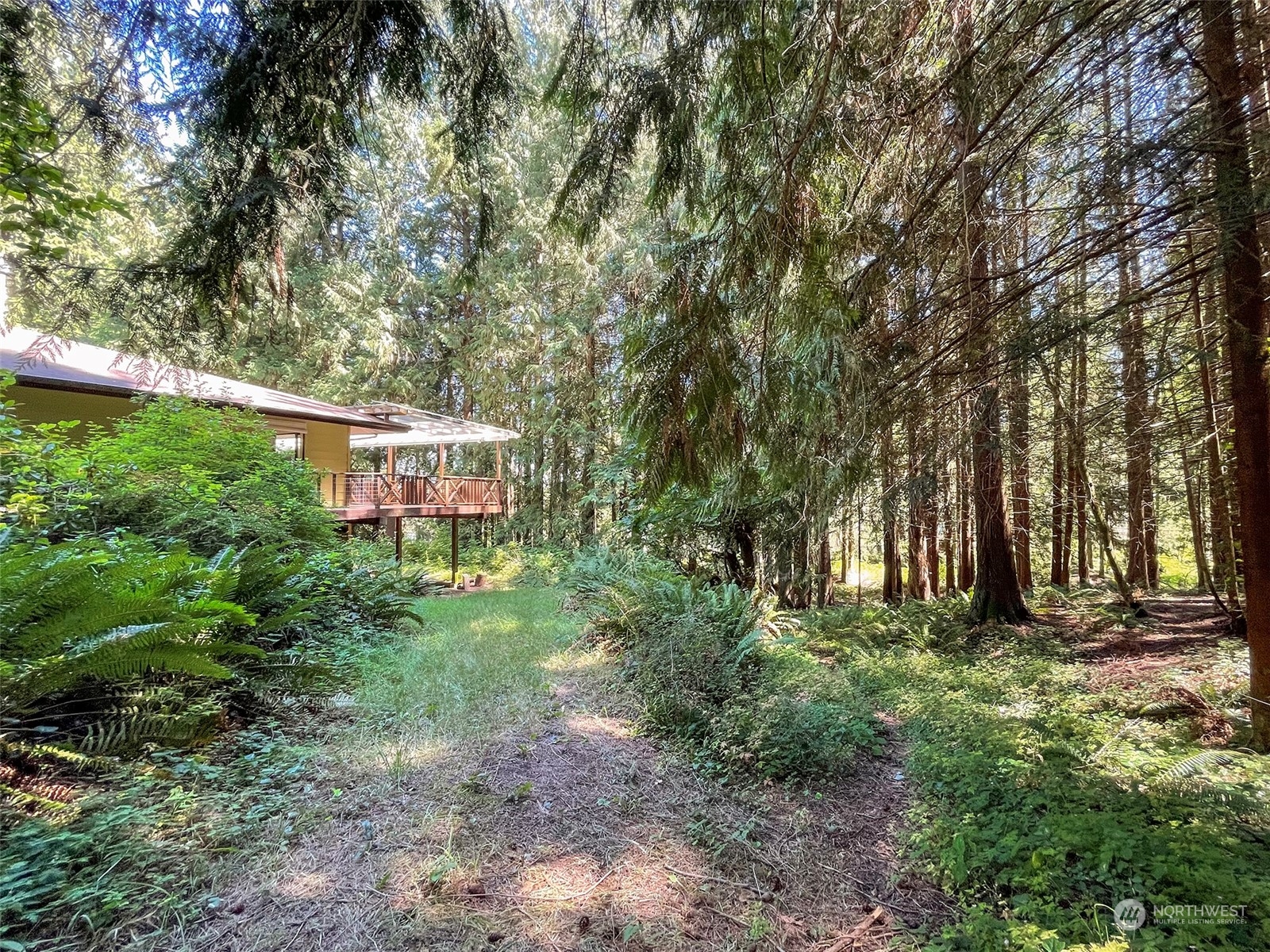 104 Waldo Road Sequim, WA 98382 - Photo 38 of 40 a view of a house with a yard