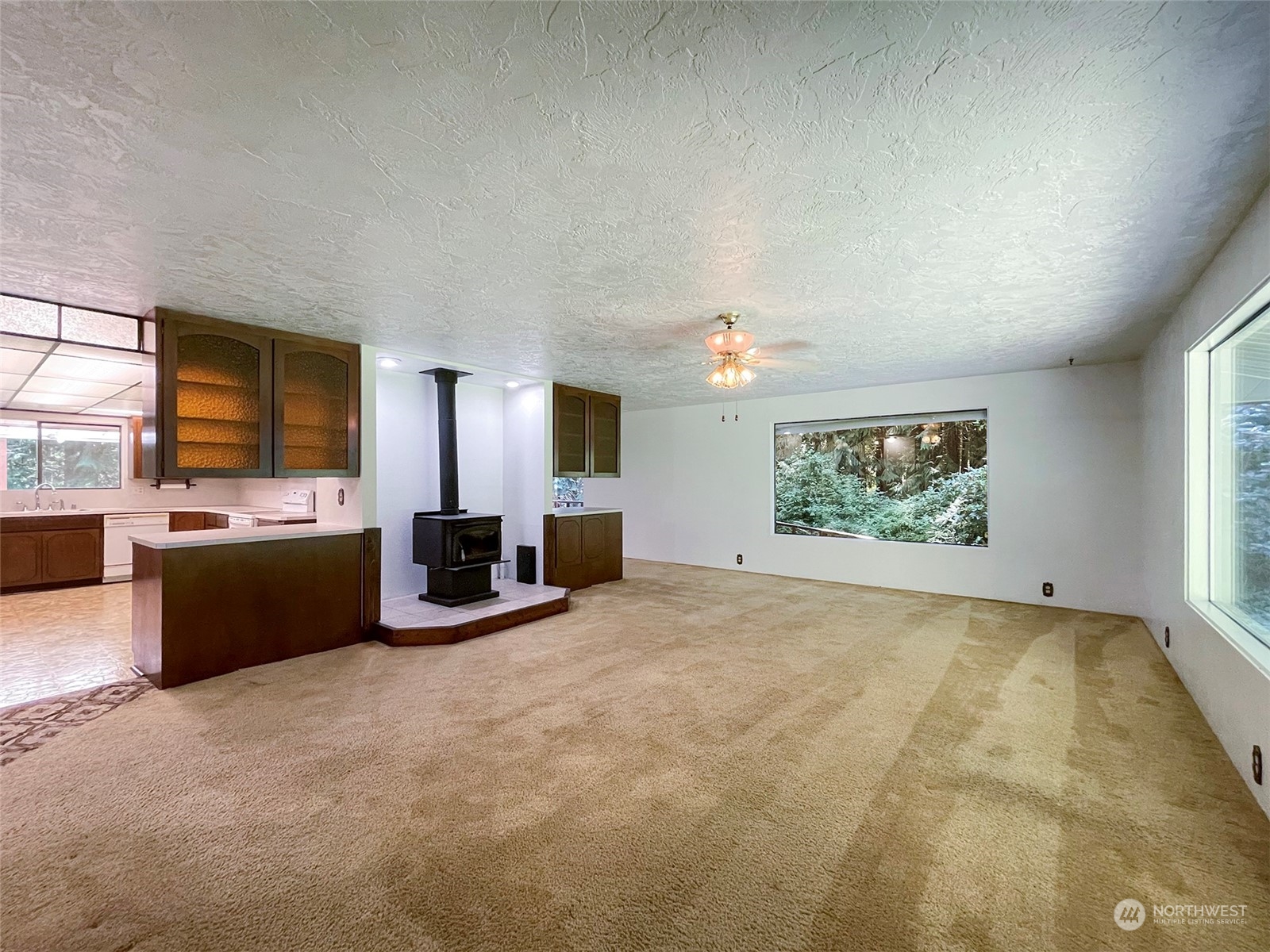 104 Waldo Road Sequim, WA 98382 - Photo 6 of 40 a view of a livingroom with furniture and a flat screen tv