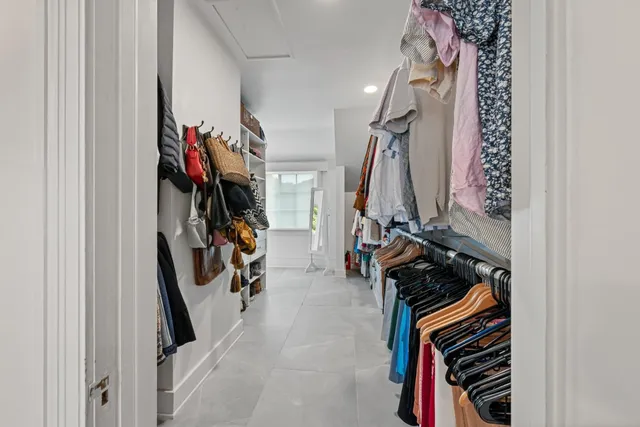 a view of a closet with storage