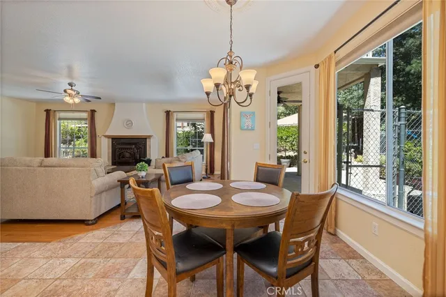 a living room with a fireplace and a window