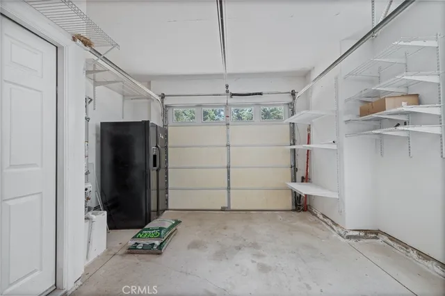 a view of balcony with wooden floor and fence