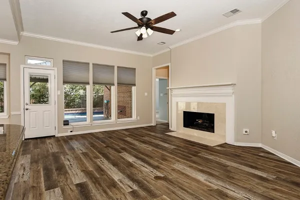 a spacious bathroom with a bathtub and a double sink shower