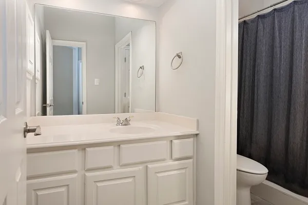 a view of outdoor space with wooden floor and fence