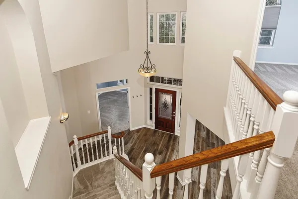 a kitchen with stainless steel appliances granite countertop a stove sink and cabinets