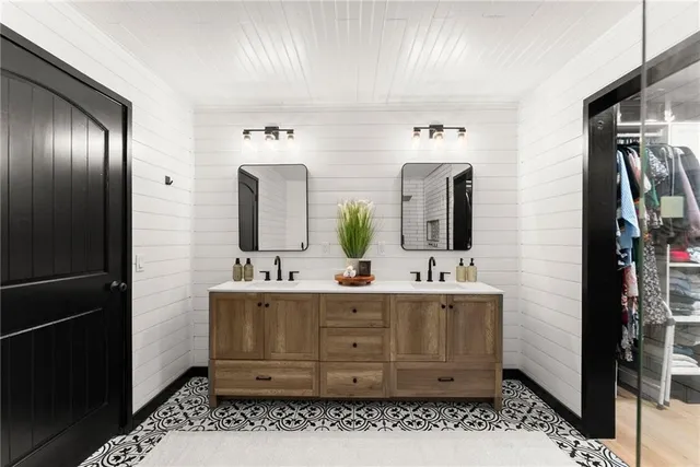 a view of a workspace with furniture and wooden floor