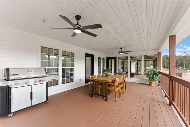 a view of a yard with an outdoor seating