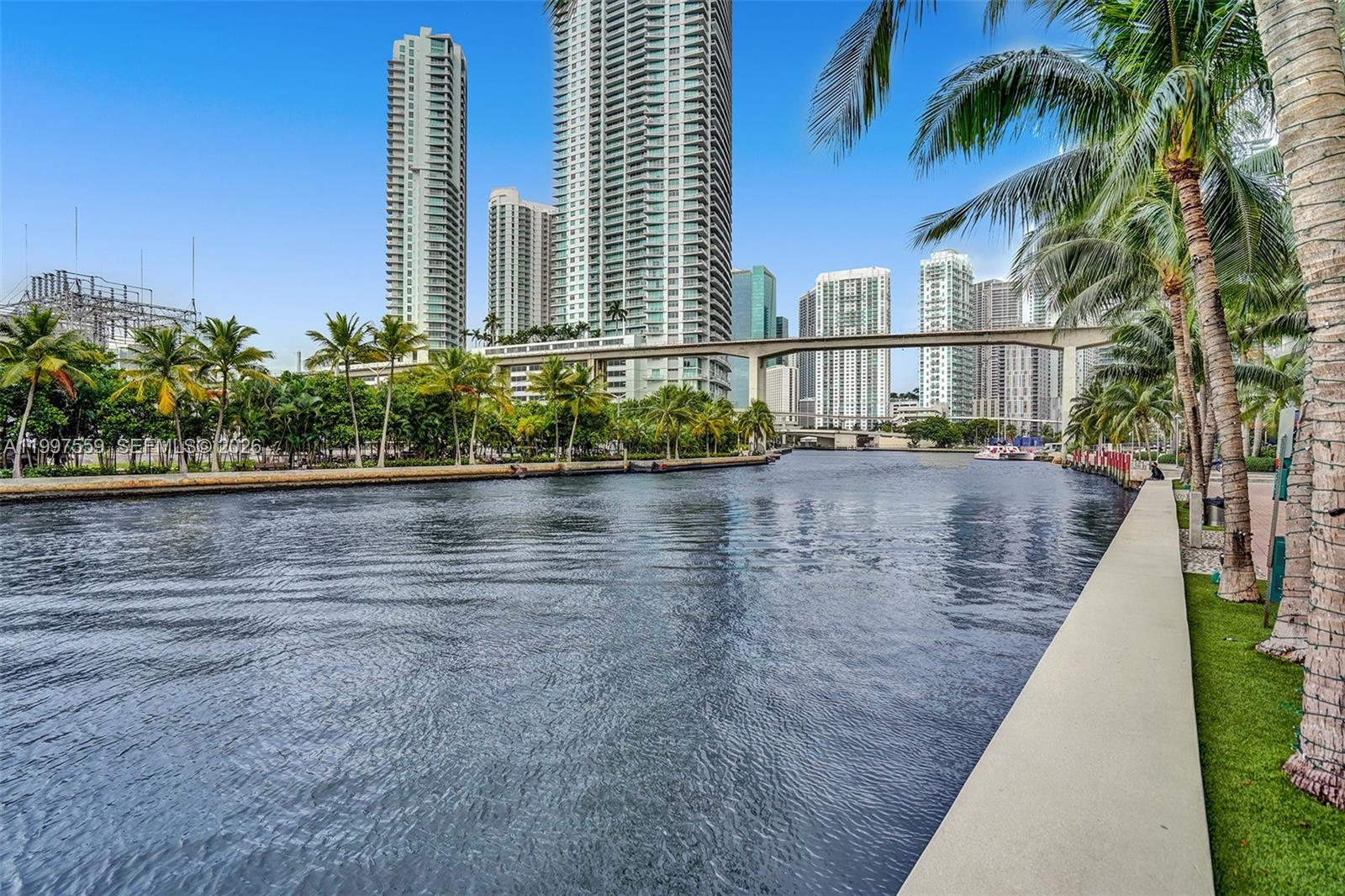 185 Southwest 7th Street, Unit 2303 Miami, FL 33130 - Photo 27 of 40 a view of a lake with a yard