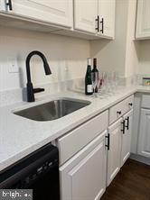 9407 Colesville Road, Unit B Silver Spring, MD 20901 - Photo 12 of 48 Modern kitchen with sleek finishes.