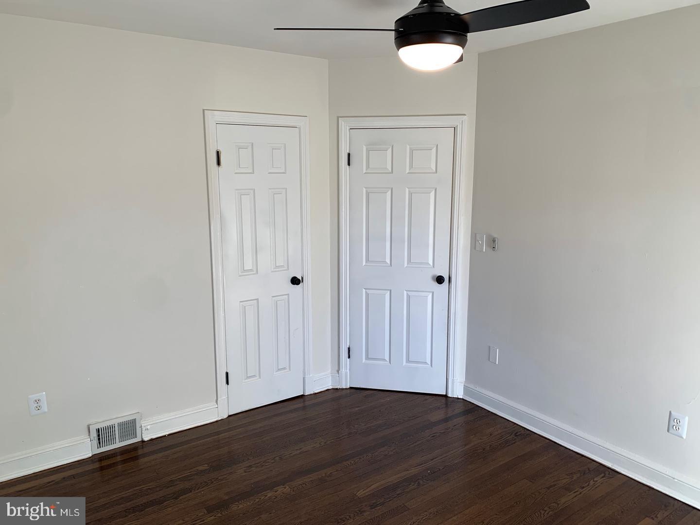 9407 Colesville Road, Unit B Silver Spring, MD 20901 - Photo 30 of 48 Bright and airy room with dual doors.