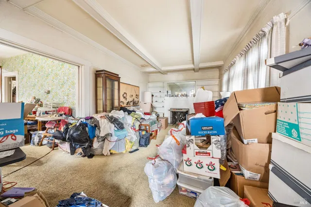 a bed room with furniture and a window