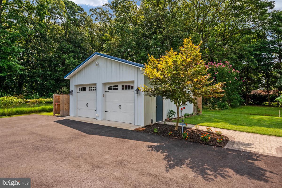 115 Rebel Road Grasonville, MD 21638 - Photo 26 of 37 25x25 Detached Garage = Great workshop