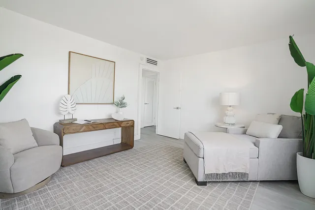 a living room with furniture and a couch