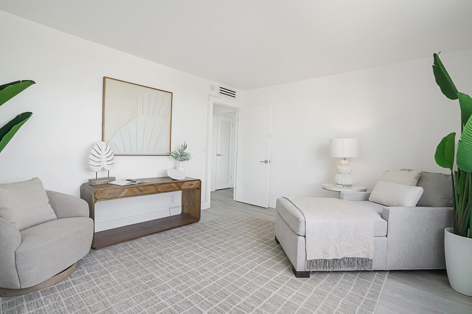 354 Chilean Avenue, Unit 4D Palm Beach, FL 33480 - Photo 11 of 23 a living room with furniture and a couch