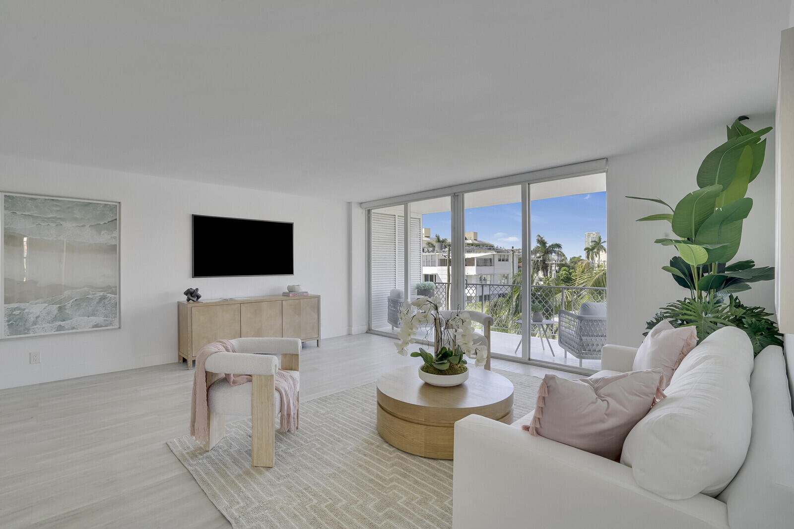 354 Chilean Avenue, Unit 4D Palm Beach, FL 33480 - Photo 13 of 23 a living room with furniture and a flat screen tv