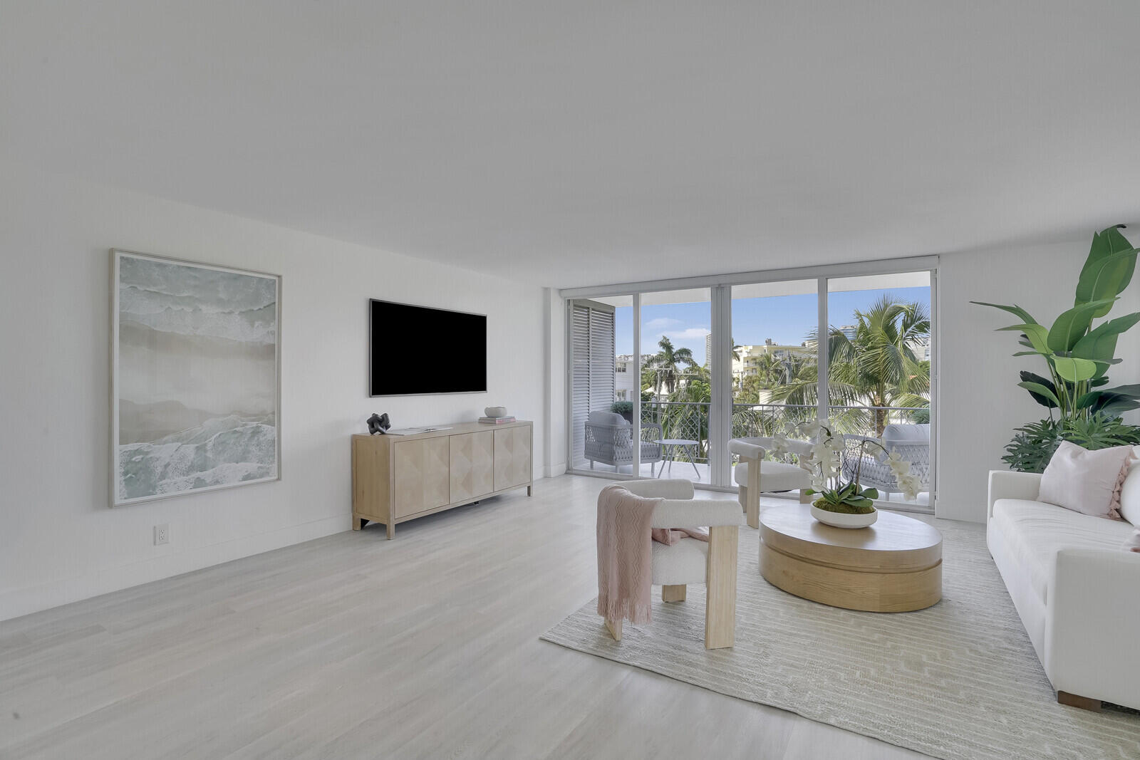 354 Chilean Avenue, Unit 4D Palm Beach, FL 33480 - Photo 14 of 23 a living room with furniture and a flat screen tv