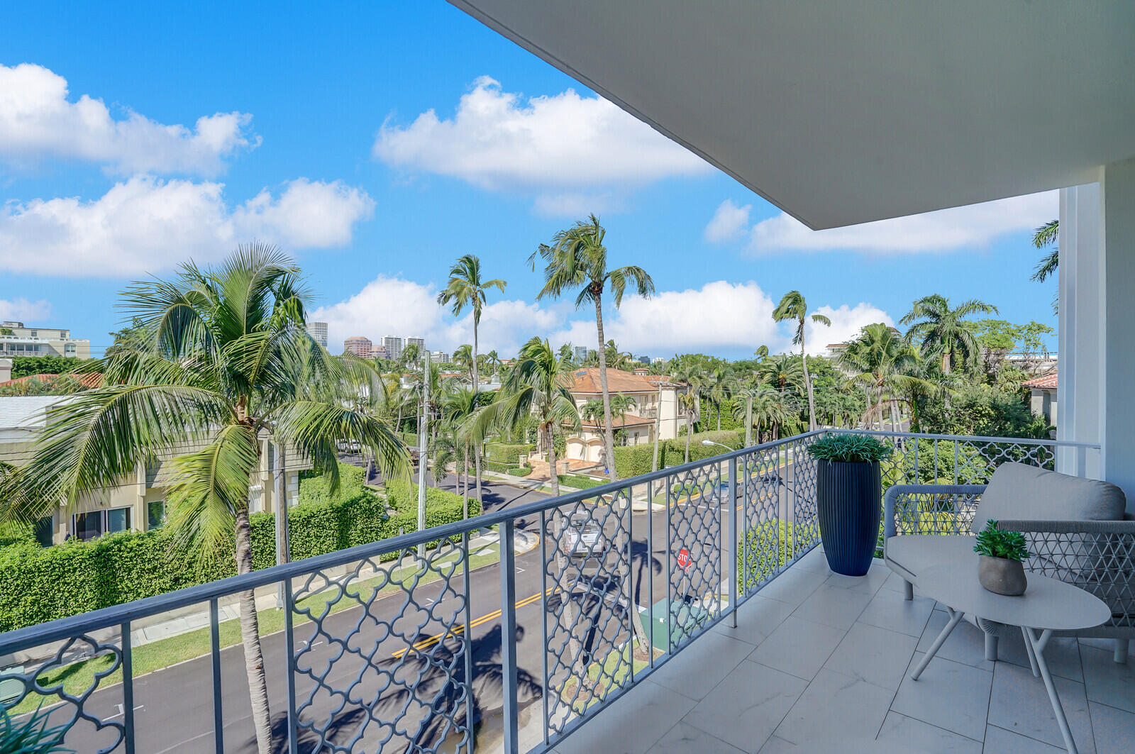 354 Chilean Avenue, Unit 4D Palm Beach, FL 33480 - Photo 21 of 23 a view of a balcony with potted plants