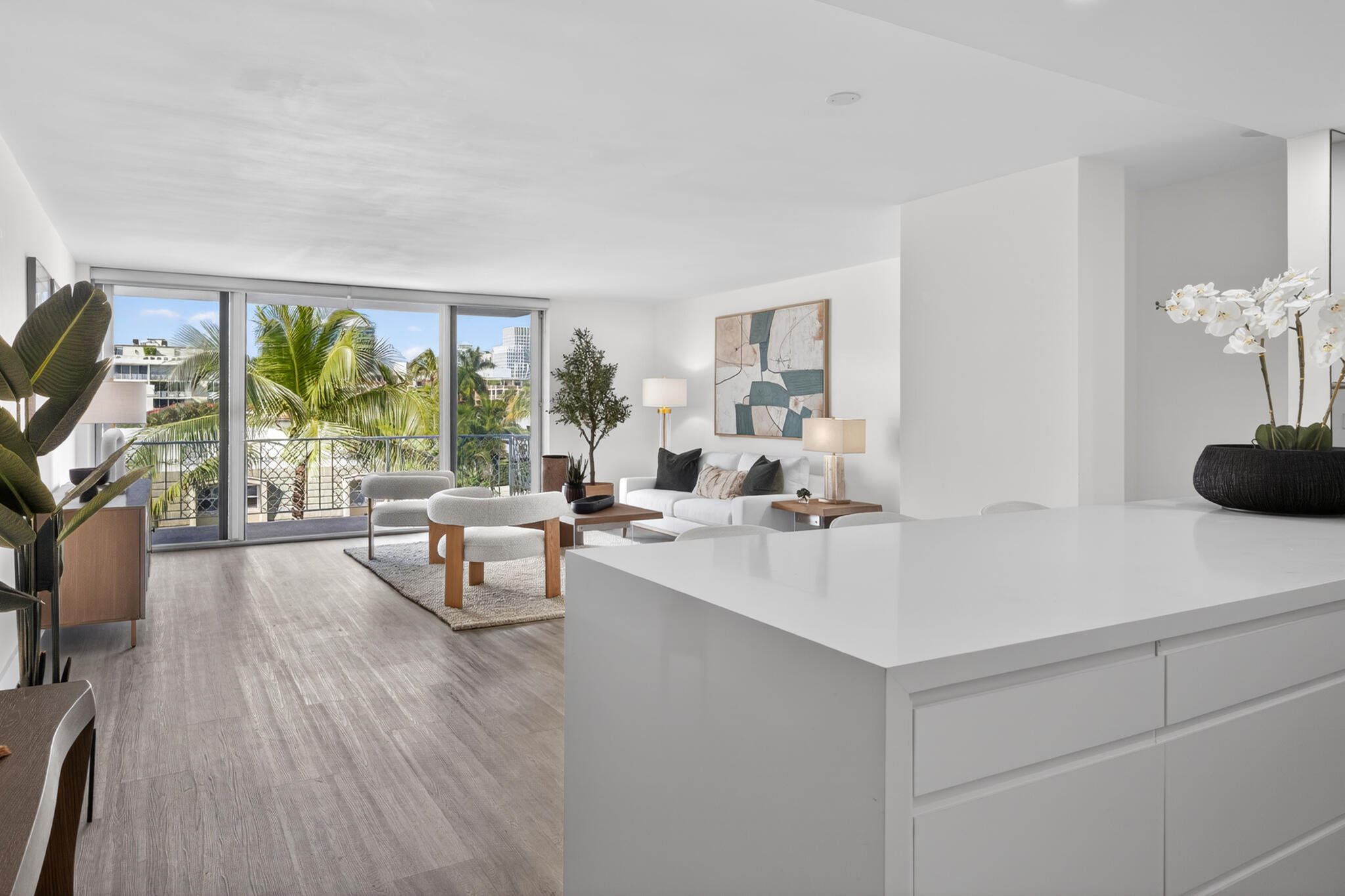 354 Chilean Avenue, Unit 4D Palm Beach, FL 33480 - Photo 3 of 23 a living room with furniture and a large window