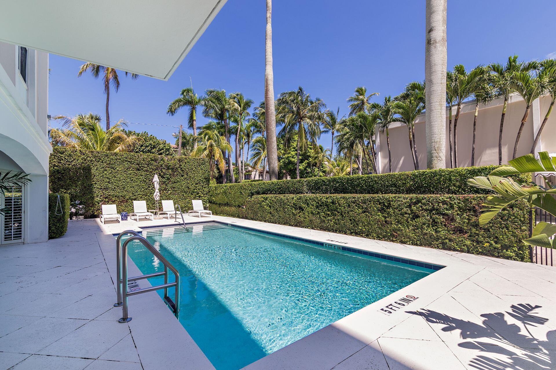 354 Chilean Avenue, Unit 4D Palm Beach, FL 33480 - Photo 5 of 23 a view of a chairs and table in patio