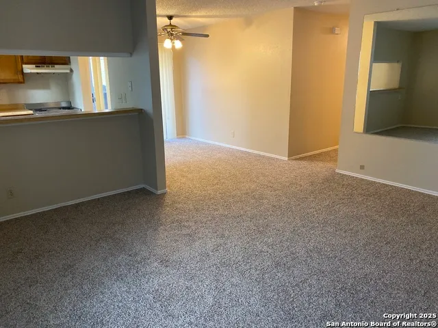 a view of kitchen and utility room