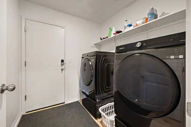 a utility room with dryer and washer
