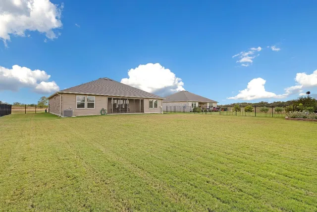 a front view of a house with a ocean view