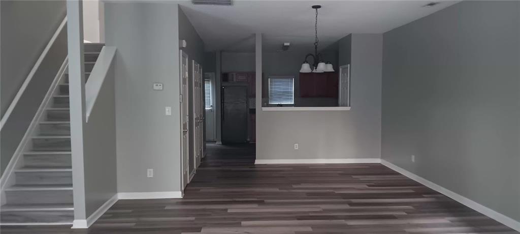 2324 Coach Way Jonesboro, GA 30236 - Photo 12 of 15 a view of a hallway with wooden floor and entryway