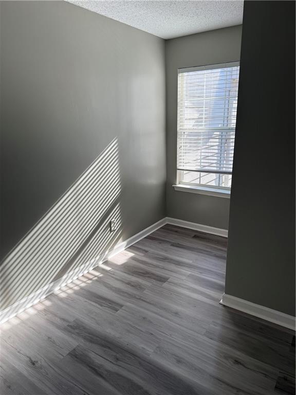 2324 Coach Way Jonesboro, GA 30236 - Photo 4 of 15 a view of a room with wooden floor and windows
