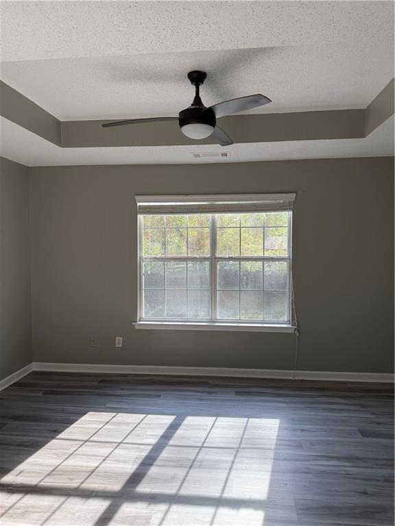 2324 Coach Way Jonesboro, GA 30236 - Photo 5 of 15 a view of an empty room with wooden floor and a window