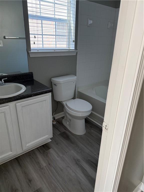 2324 Coach Way Jonesboro, GA 30236 - Photo 6 of 15 a bathroom with a toilet a sink and a window