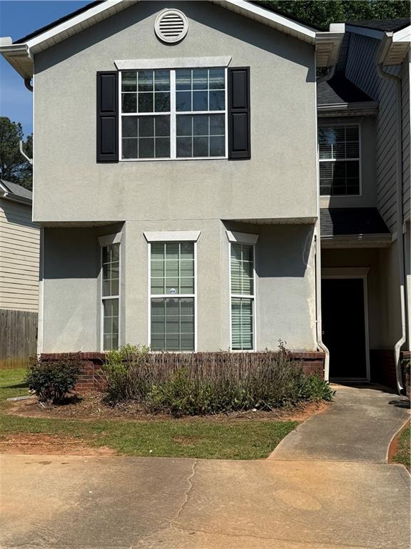 2324 Coach Way Jonesboro, GA 30236 - Photo 10 of 15 a front view of a house with a yard