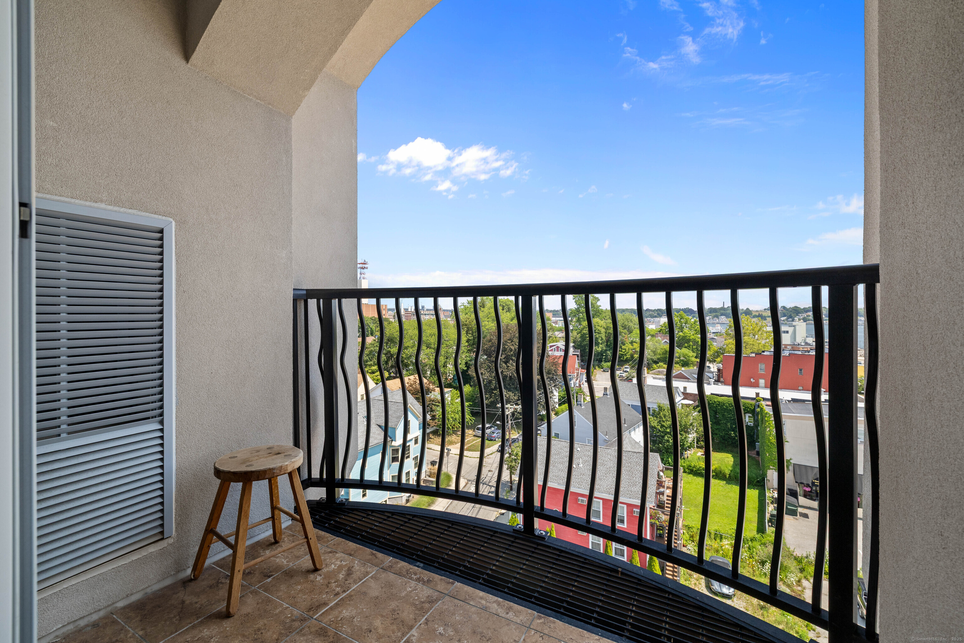 461 Bank Street, Unit 802 New London, CT 06320 - Photo 16 of 35 a view of a balcony with chairs
