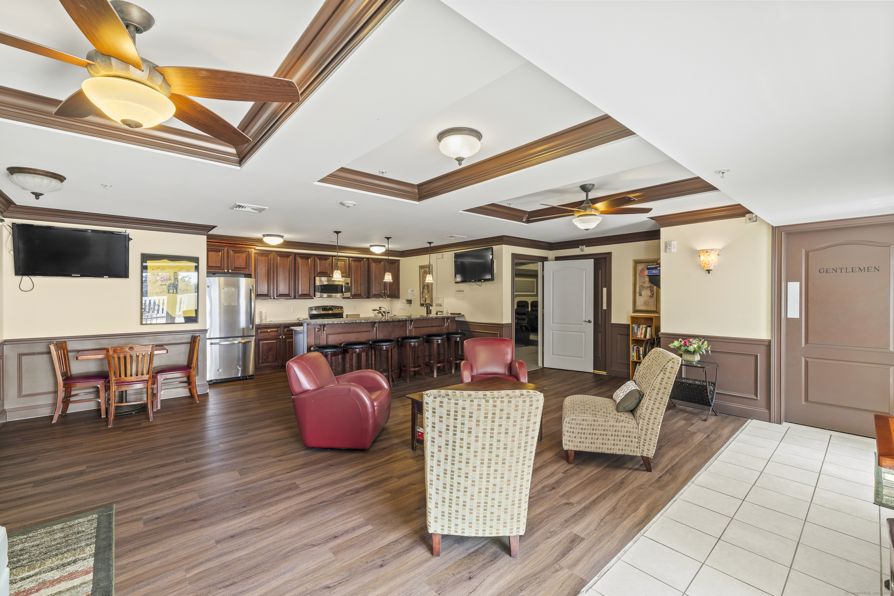 461 Bank Street, Unit 802 New London, CT 06320 - Photo 29 of 35 a living room with furniture and wooden floor