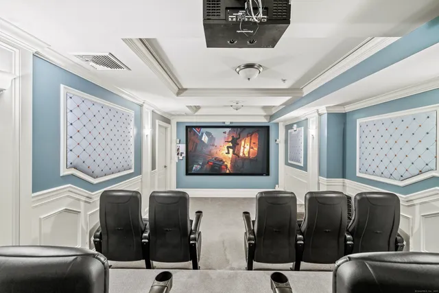 a bathroom with mirror and window