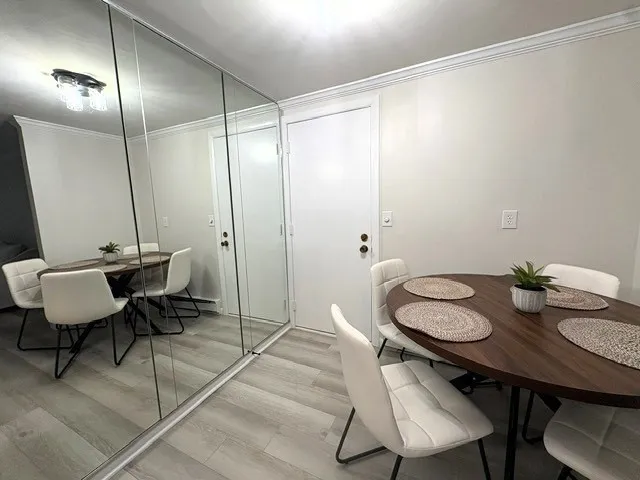 a view of a dining room with furniture