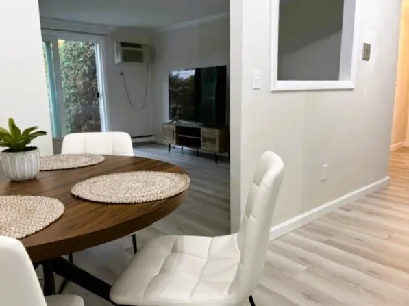a view of a dining room with furniture