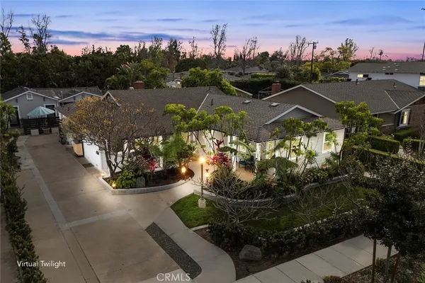 a house view with a swimming pool