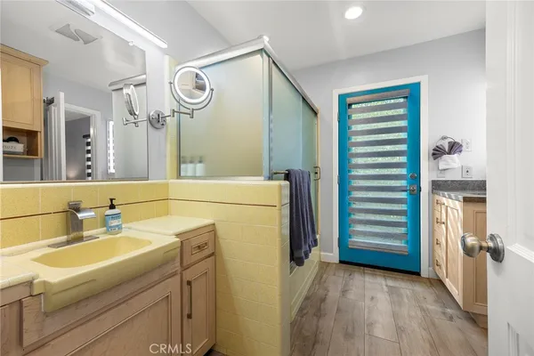 a view of a backyard with swimming pool