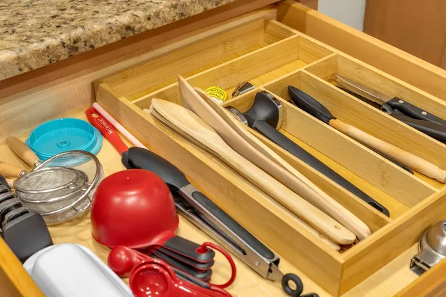 a view of a tennis room with wooden floor