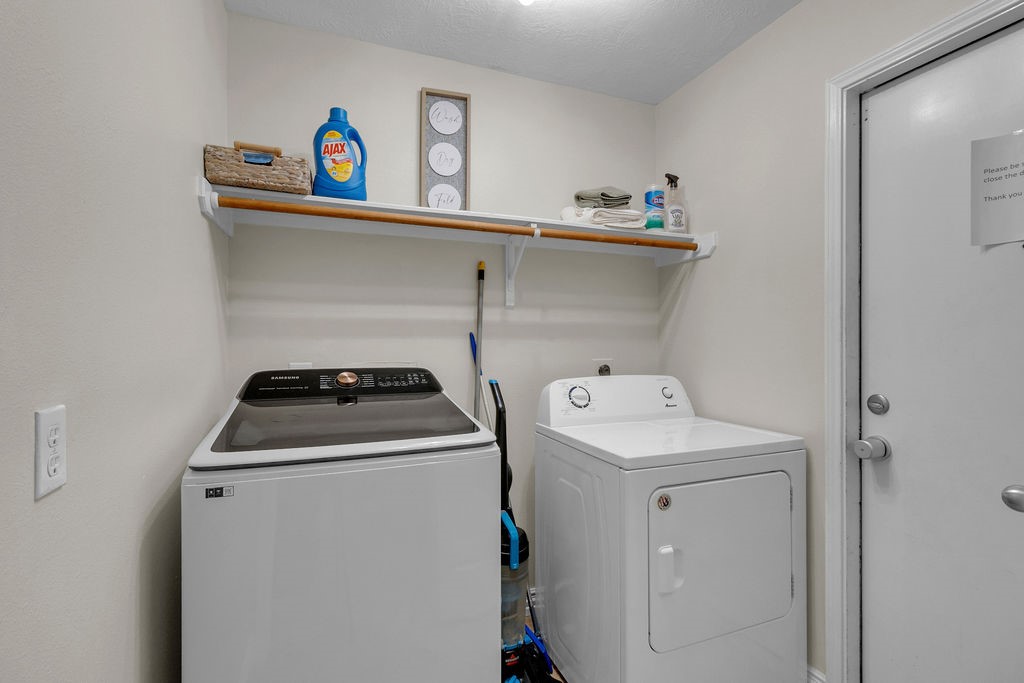 746 Cape Cottage Lane Spring, TX 77373 - Photo 22 of 36 a utility room with dryer and washer