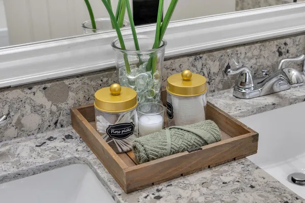 a bedroom with a bed and a night stand