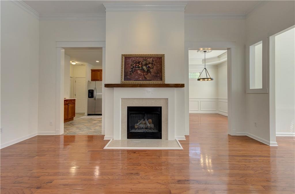 232 Glens Loop Woodstock, GA 30188 - Photo 13 of 52 a living room with furniture and a fireplace