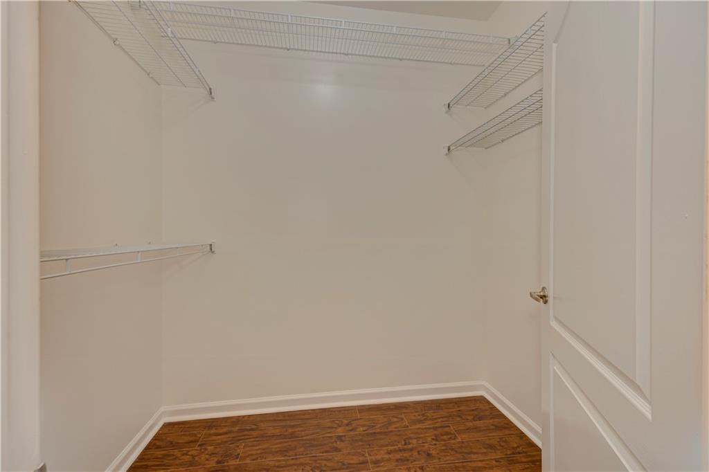 232 Glens Loop Woodstock, GA 30188 - Photo 42 of 52 a view of small space with racks on the wall