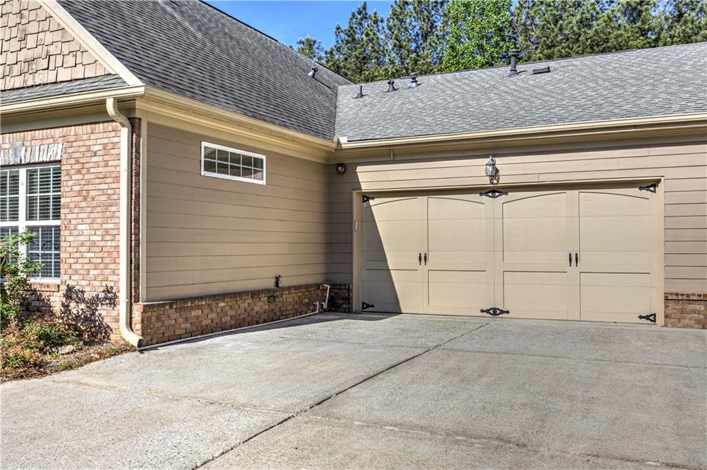 232 Glens Loop Woodstock, GA 30188 - Photo 6 of 52 a view of a garage