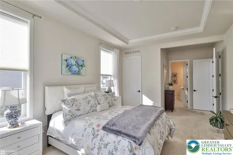 a kitchen with stainless steel appliances granite countertop a sink refrigerator and cabinets